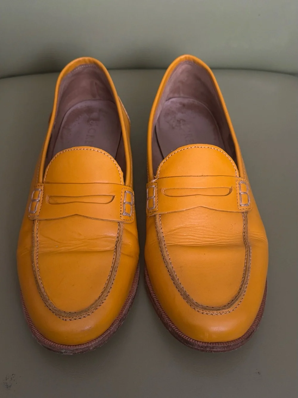 J. Crew Women’s Leather Penny Loafers in Mustard Yellow